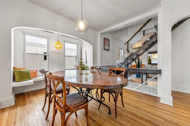 dining area with wood-type flooring