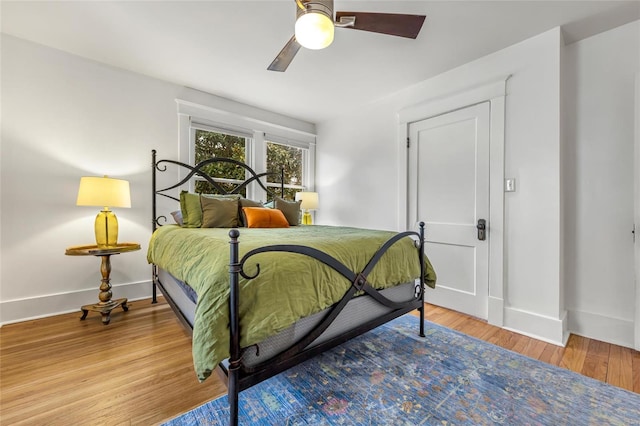 bedroom featuring ceiling fan and wood-type flooring