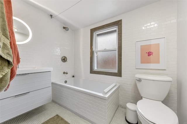 bathroom with tile patterned floors, vanity, and toilet