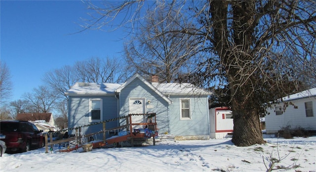 view of snow covered property