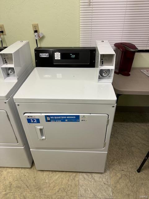 shared laundry area with washer and dryer