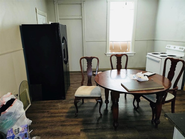 dining room featuring dark hardwood / wood-style flooring