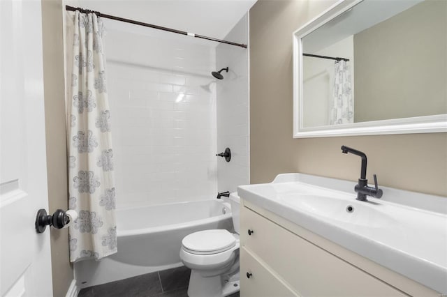 bathroom featuring shower / bath combo, vanity, and toilet