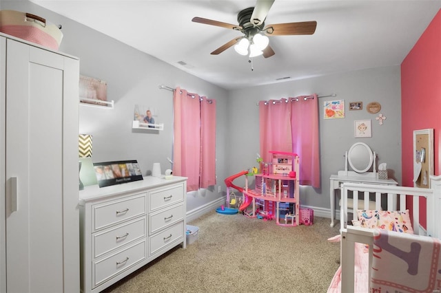 bedroom featuring a ceiling fan, carpet flooring, visible vents, and baseboards