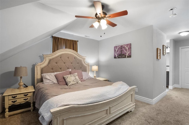 carpeted bedroom with ceiling fan and baseboards