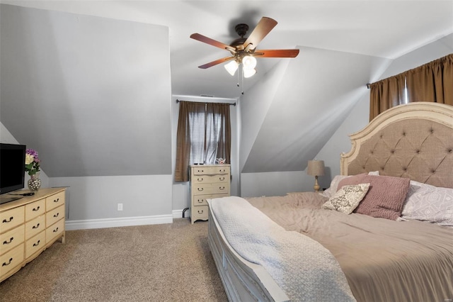 bedroom featuring lofted ceiling, ceiling fan, baseboards, and carpet flooring