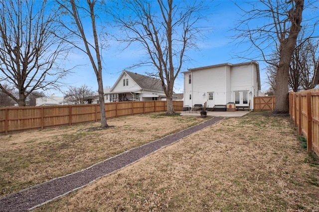 view of yard featuring a fenced backyard and a patio