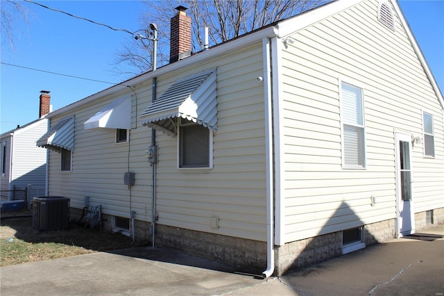 view of home's exterior with central air condition unit