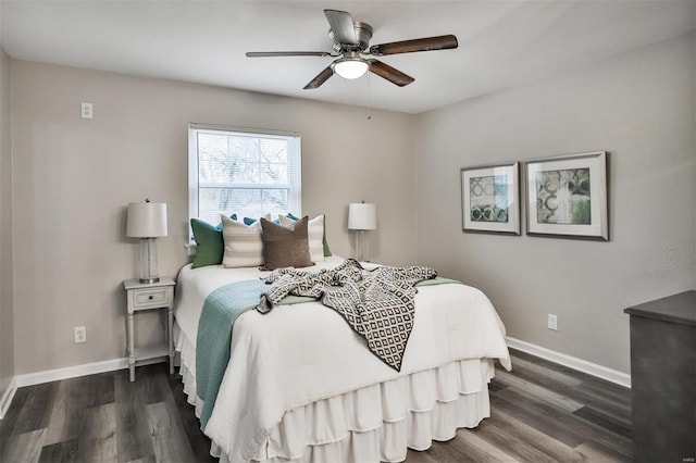 bedroom featuring dark wood-type flooring and ceiling fan