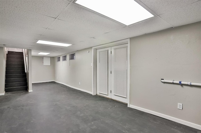 basement with a drop ceiling