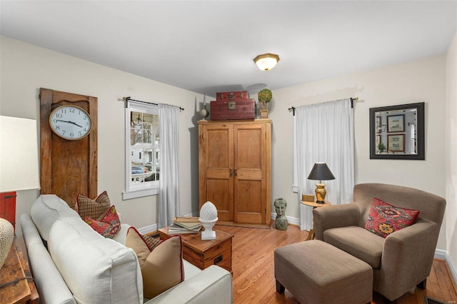 sitting room featuring light hardwood / wood-style flooring