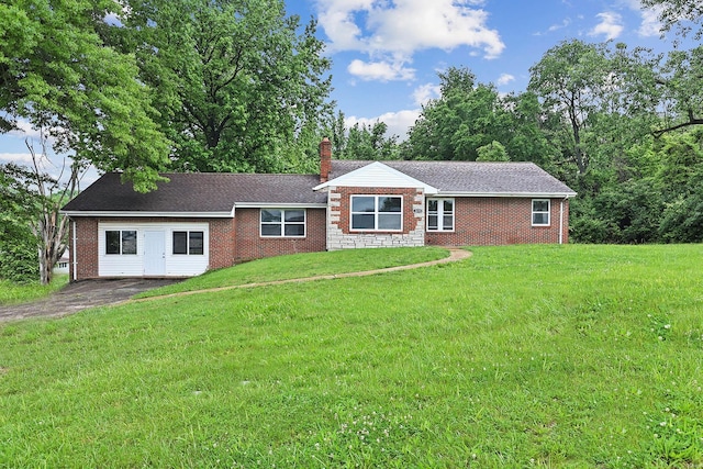 ranch-style house with a front lawn