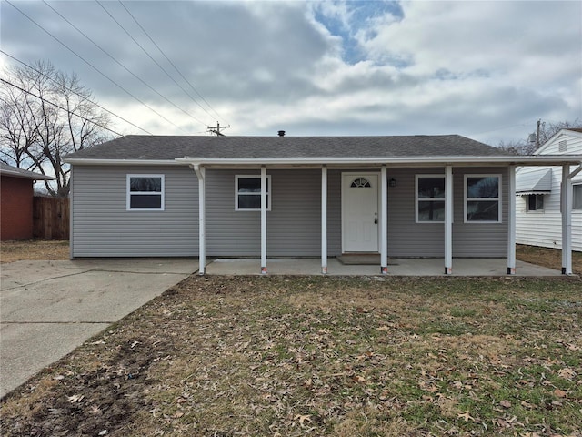 single story home featuring covered porch