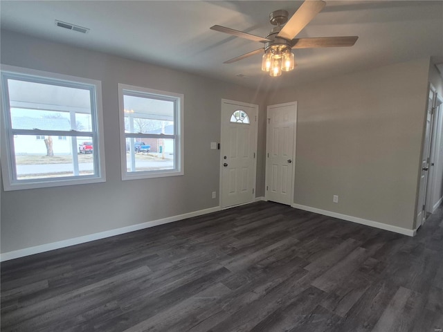 foyer featuring dark hardwood / wood-style flooring and ceiling fan