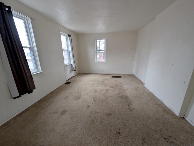 view of carpeted spare room