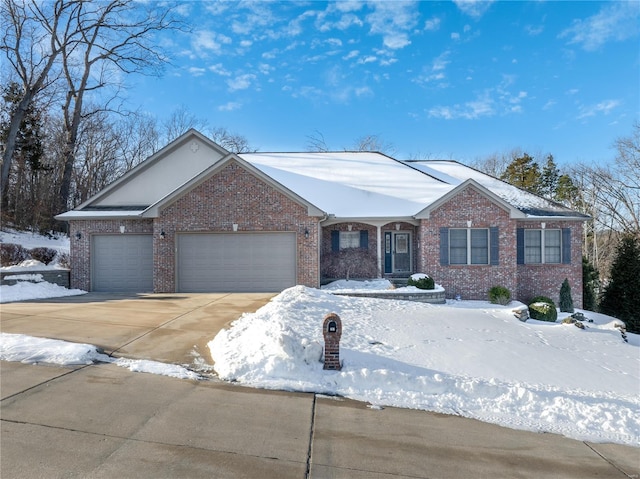 single story home featuring a garage