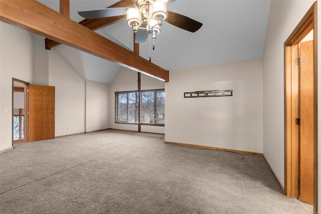 empty room with ceiling fan, beam ceiling, high vaulted ceiling, and light carpet