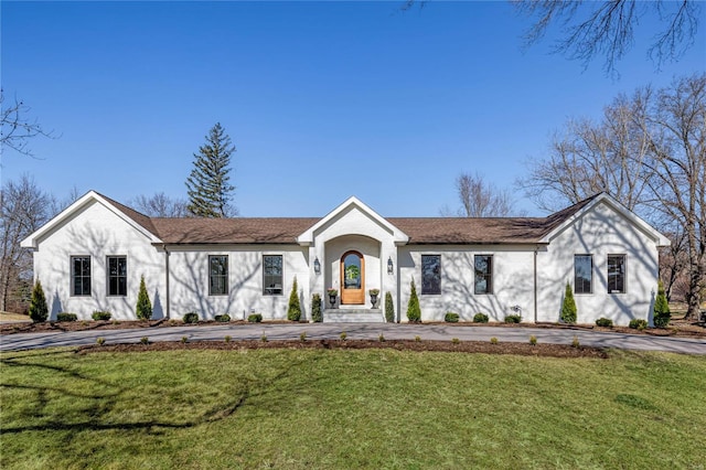 view of front of home with a front lawn