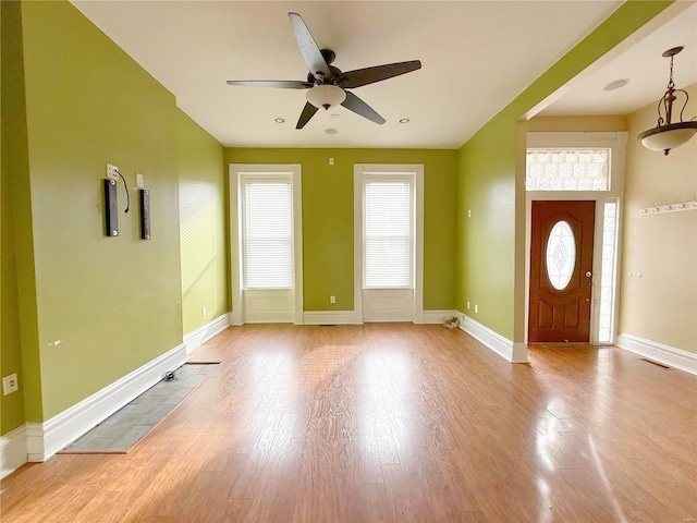 interior space featuring ceiling fan and light hardwood / wood-style floors