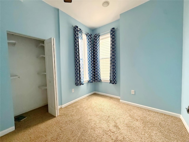 unfurnished bedroom featuring carpet floors