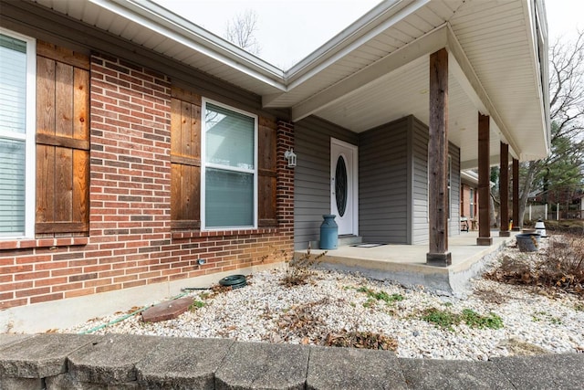 doorway to property with a porch