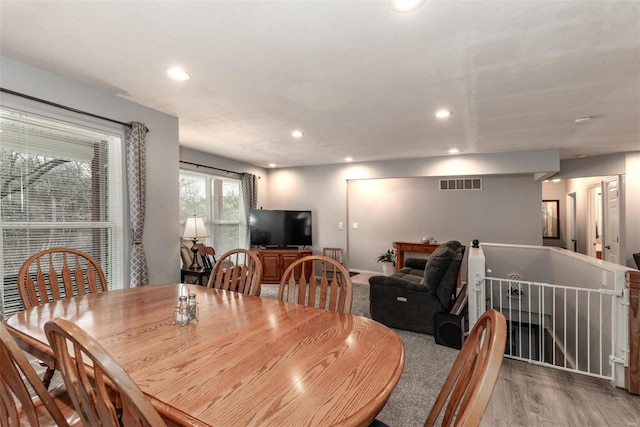 dining space featuring light hardwood / wood-style floors