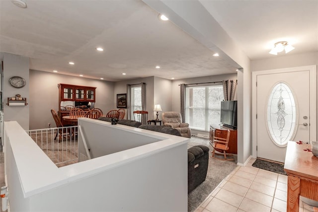 foyer featuring light tile patterned floors