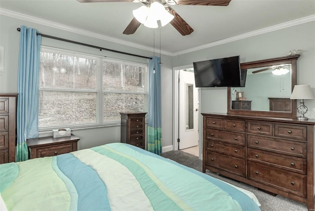 bedroom with crown molding, light colored carpet, and ceiling fan