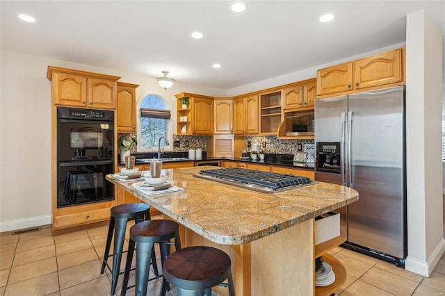 kitchen featuring light tile patterned floors, open shelves, a sink, appliances with stainless steel finishes, and backsplash