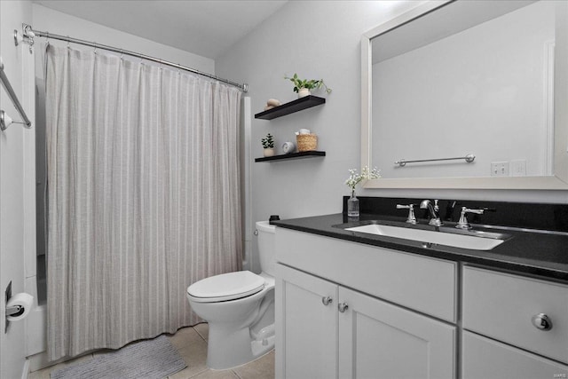 full bathroom featuring tile patterned flooring, vanity, shower / tub combo, and toilet