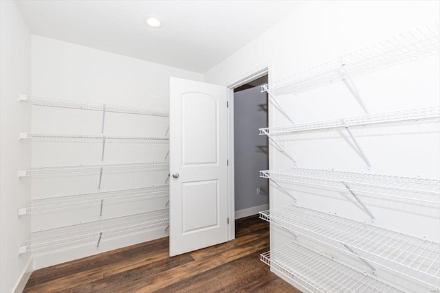 interior space with dark hardwood / wood-style floors