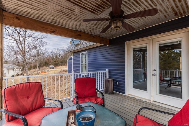 deck featuring ceiling fan and french doors