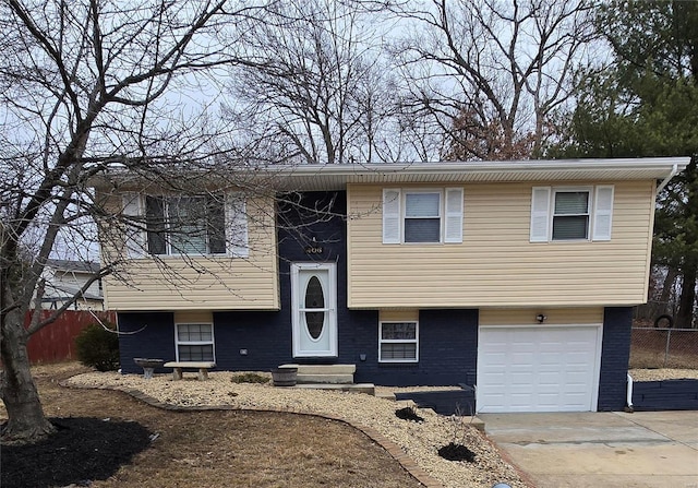 split foyer home featuring a garage