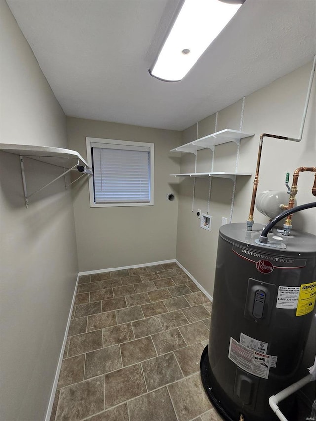 clothes washing area with water heater and hookup for an electric dryer