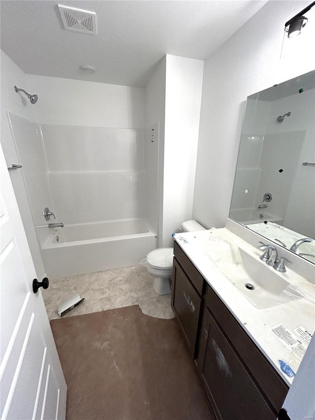 full bathroom featuring shower / bath combination, vanity, and toilet