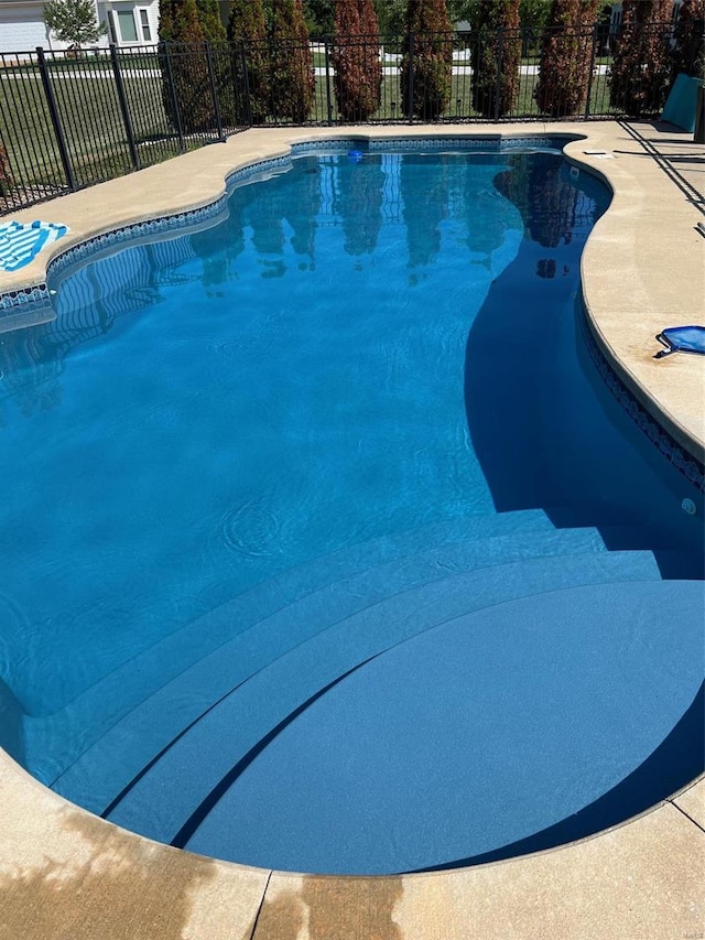 view of pool featuring a fenced in pool and fence