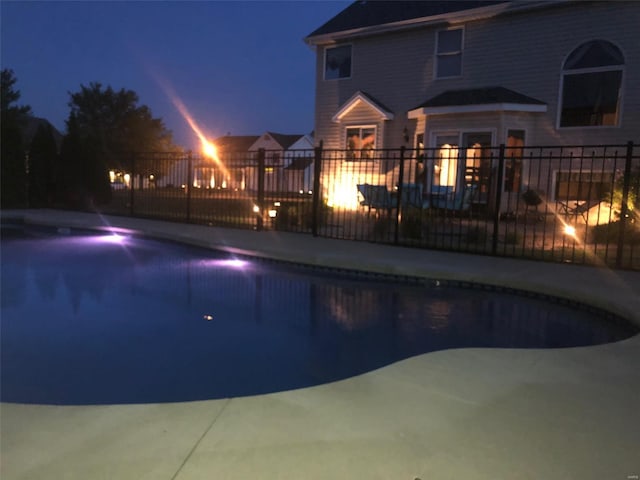 view of pool with fence and a fenced in pool