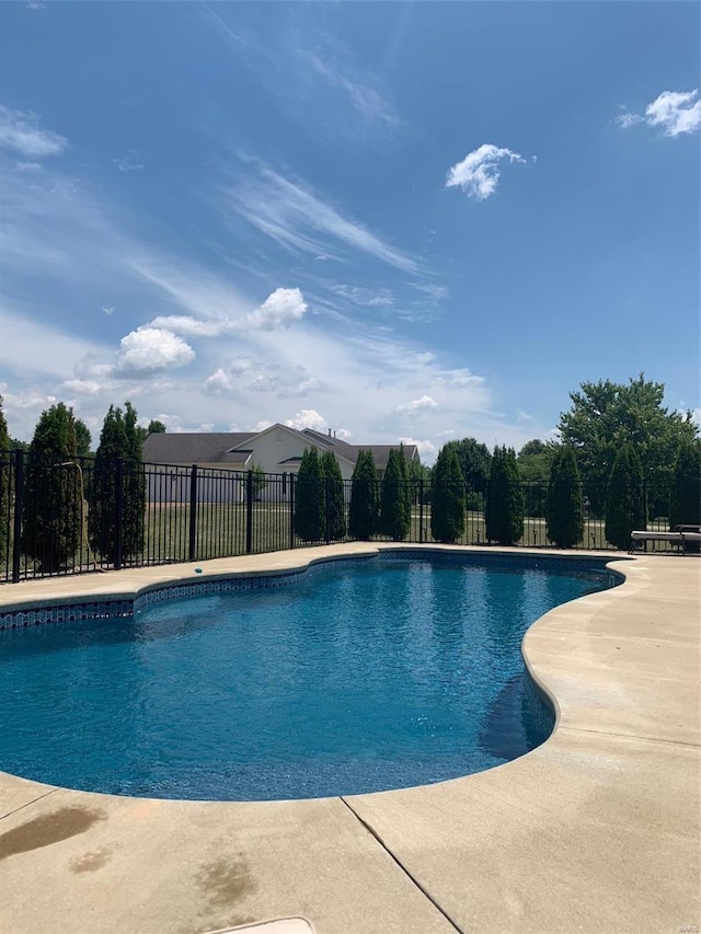 view of pool with fence, a fenced in pool, and a patio