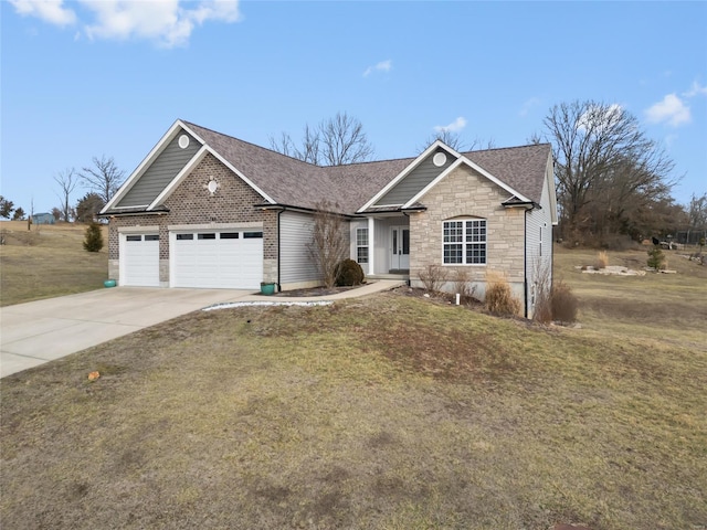 view of front of property with a garage and a front lawn