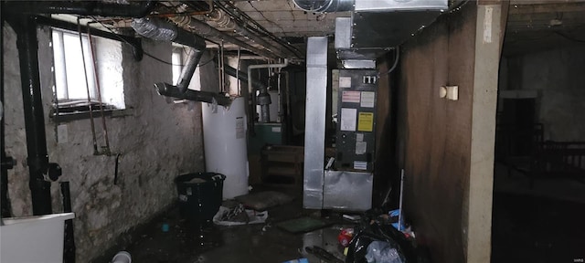 utility room featuring water heater