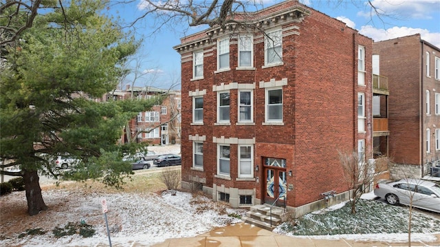 view of snow covered property