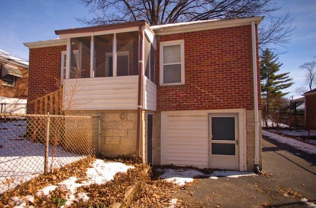 exterior space with a sunroom