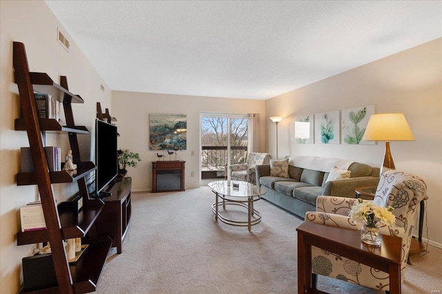 living room with light colored carpet