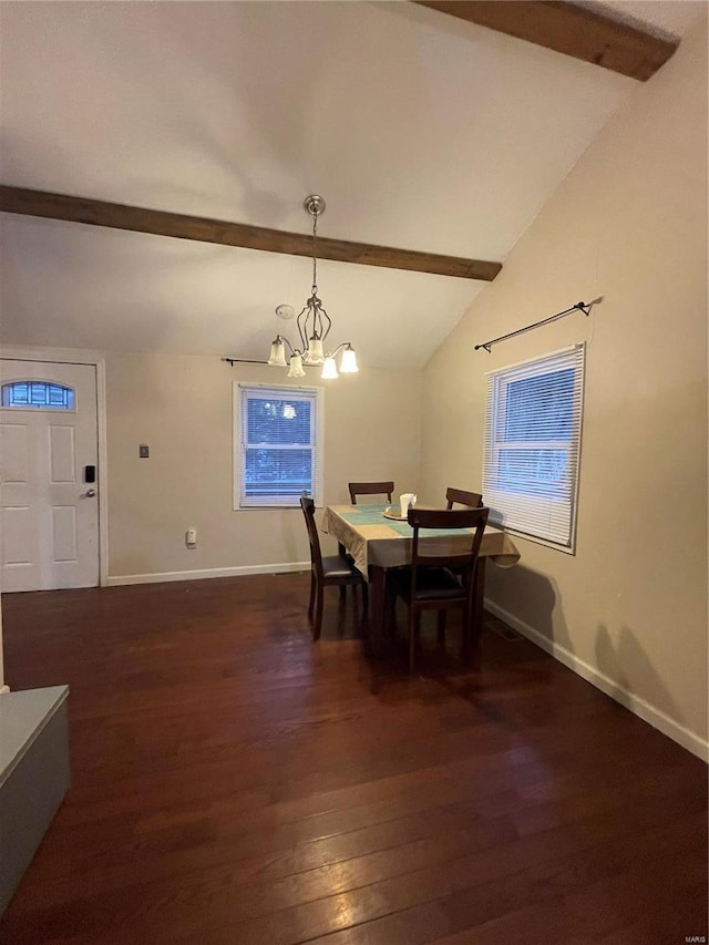 dining area featuring lofted ceiling with beams, dark wood-type flooring, a chandelier, and baseboards