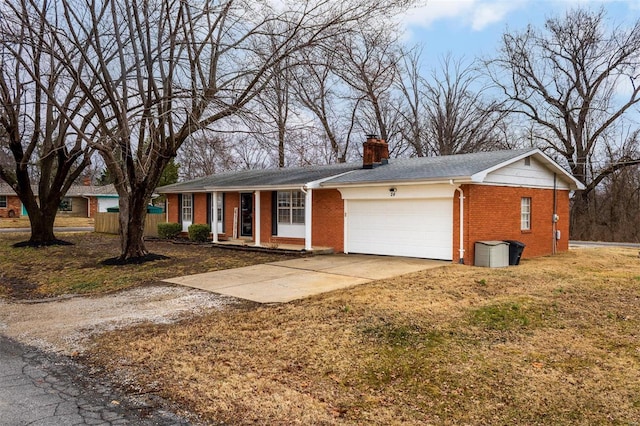 ranch-style house with a garage and a front yard