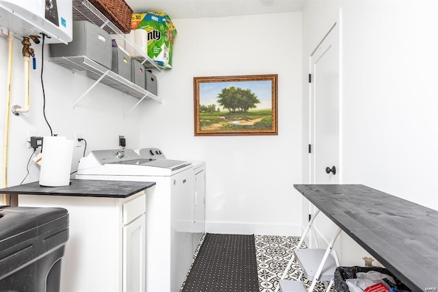 clothes washing area featuring independent washer and dryer