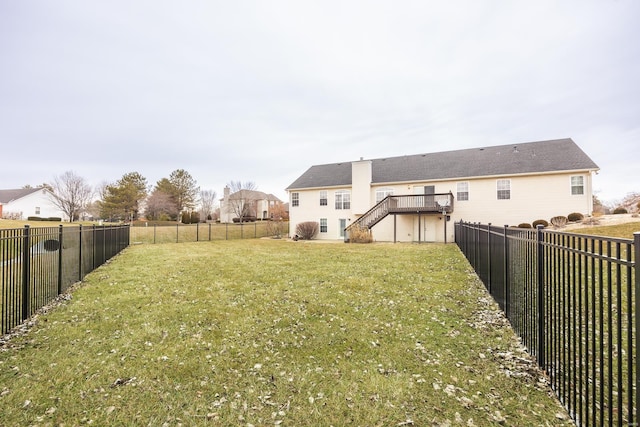 view of yard featuring a wooden deck