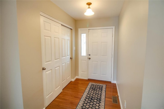 doorway featuring hardwood / wood-style floors