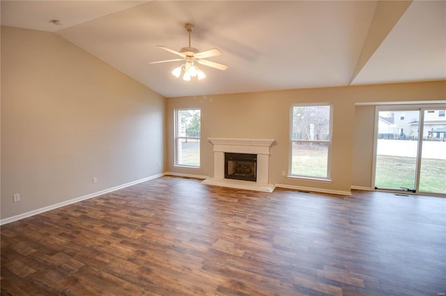 unfurnished living room featuring ceiling fan, lofted ceiling, and dark hardwood / wood-style floors