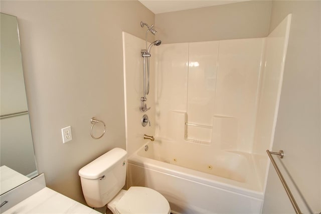 bathroom featuring shower / washtub combination and toilet